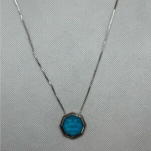 Elegant Silver Necklace with Blue Pendant